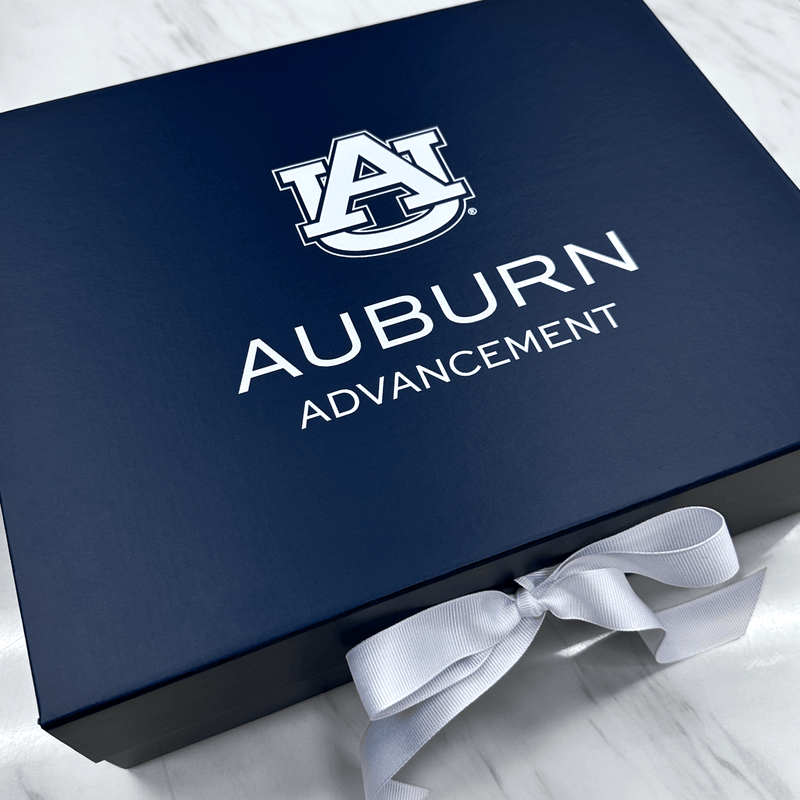 Custom printed navy blue gift boxes with grosgrain ribbon