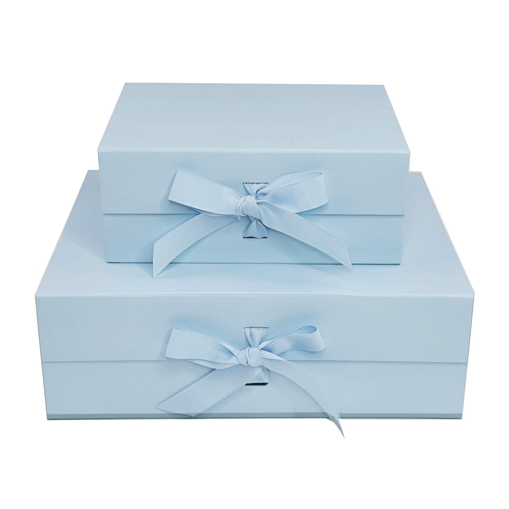 light blue foldable magnetic closure gift boxes with grosgrain ribbon stacked medium and large 