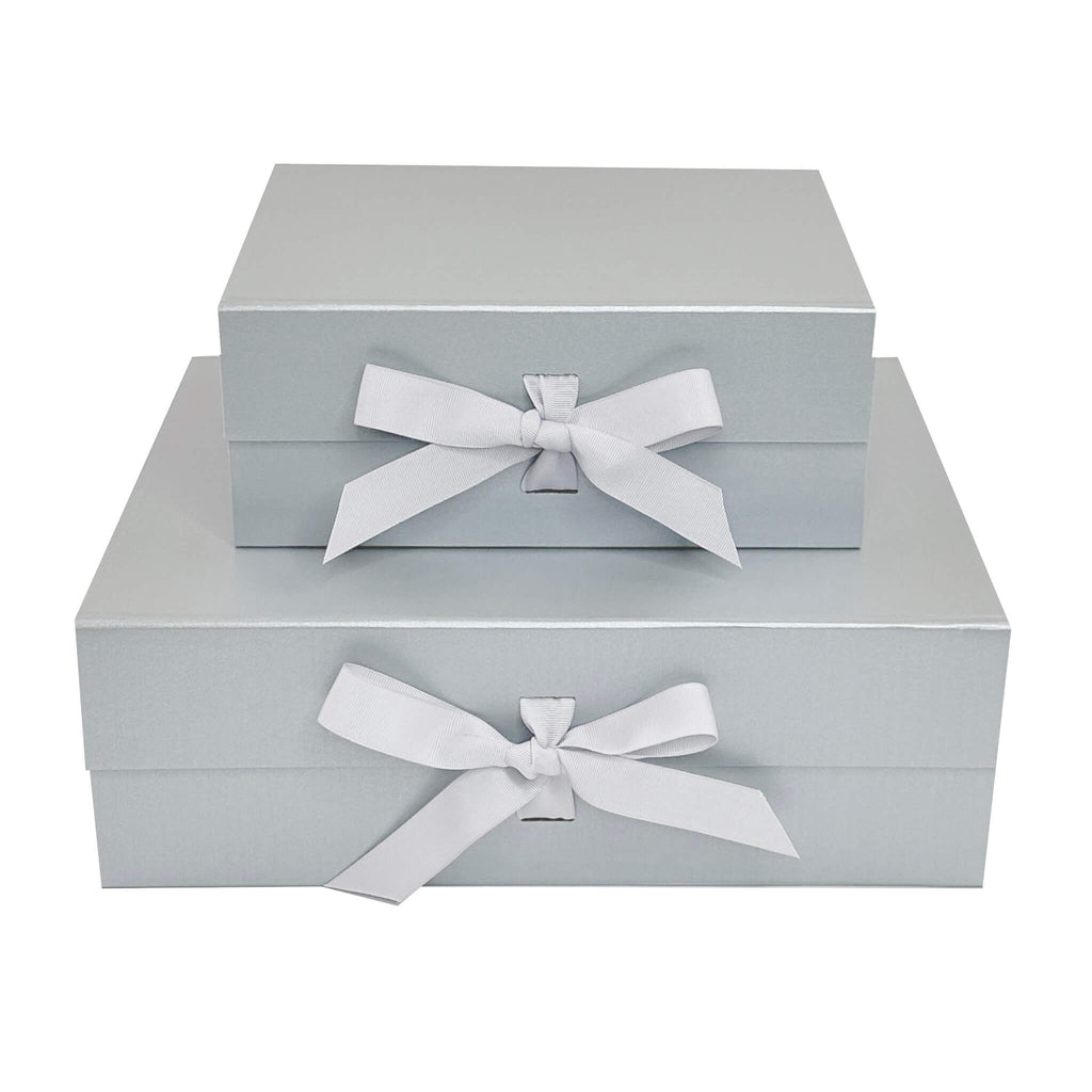 silver magnetic closure gift boxes with changeable ribbon shown two sizes medium and large