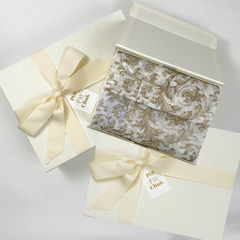 Ivory magnetic closure gift boxes with specialty tissue paper and grosgrain ribbon