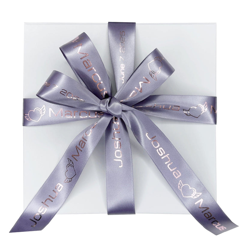 Wedding gift box tied with a custom names-and-date satin ribbon