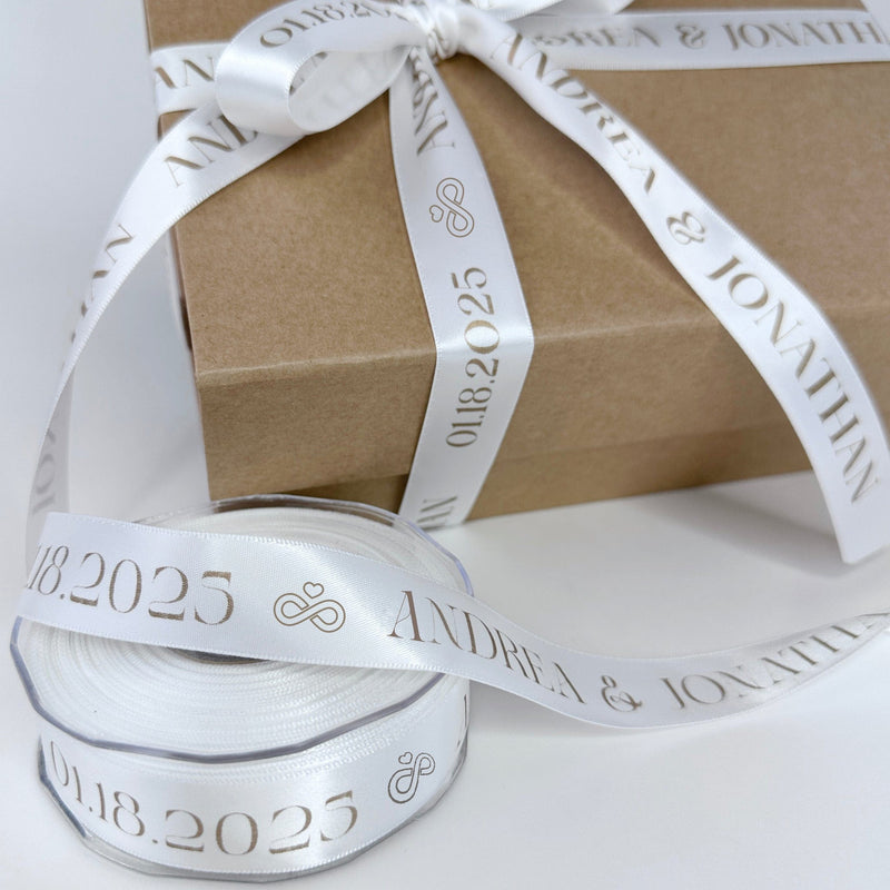 Close-up of custom printed satin ribbon tied on a gift box