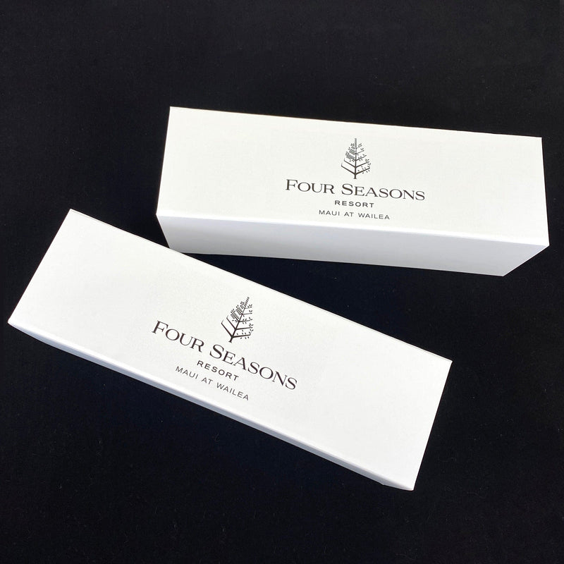White luxury wine bottle gift box with Four Seasons resort branding