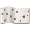 white tissue paper with green and red snowflkes